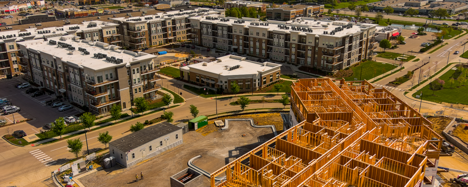 Aerial of District at Deerfield featuring completed apartment complex and phase II construction