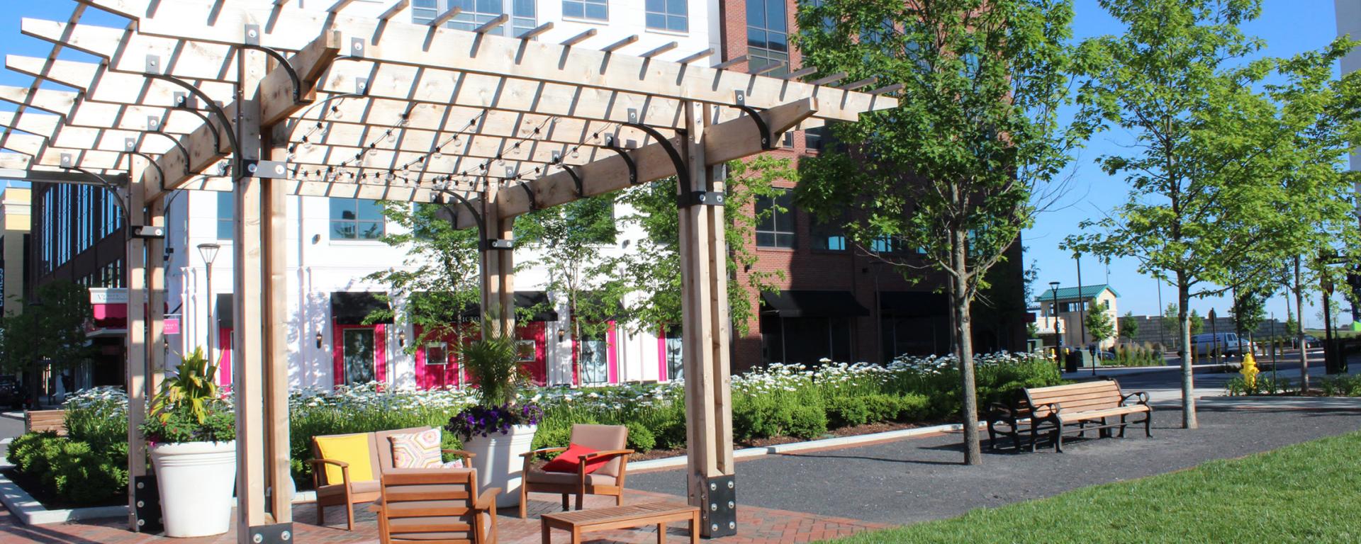 pergola and bench in park area