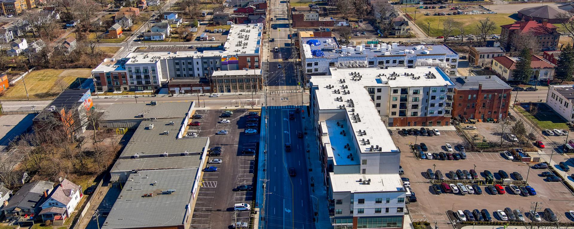aerial photo of three mixed use buildings