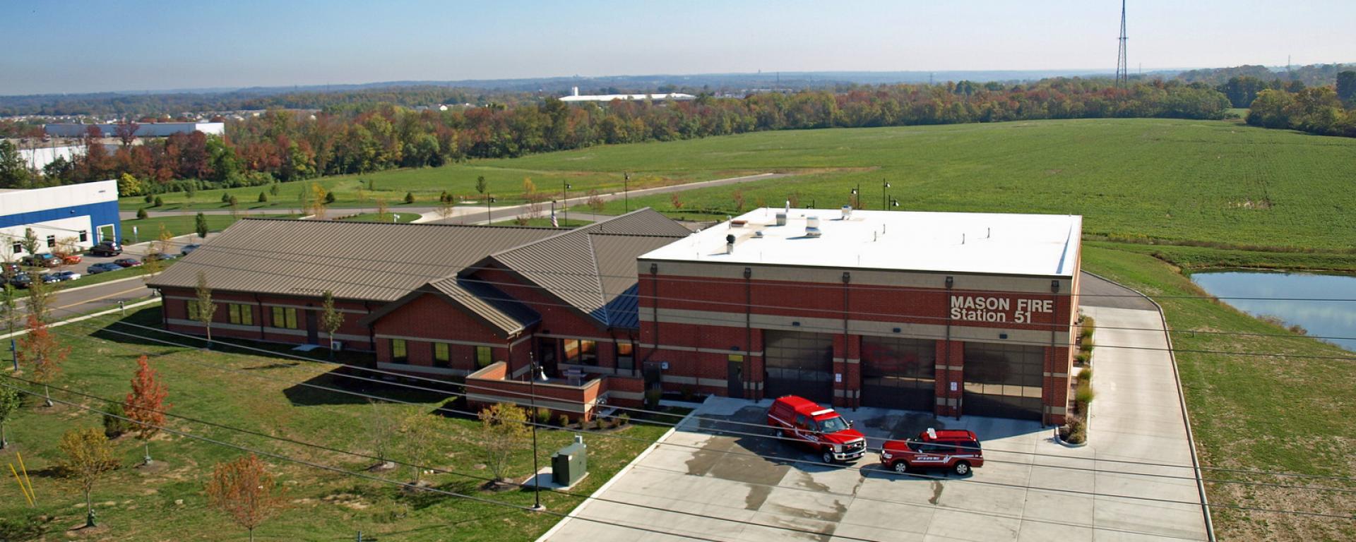 aerial of firehouse driveway and garage 
