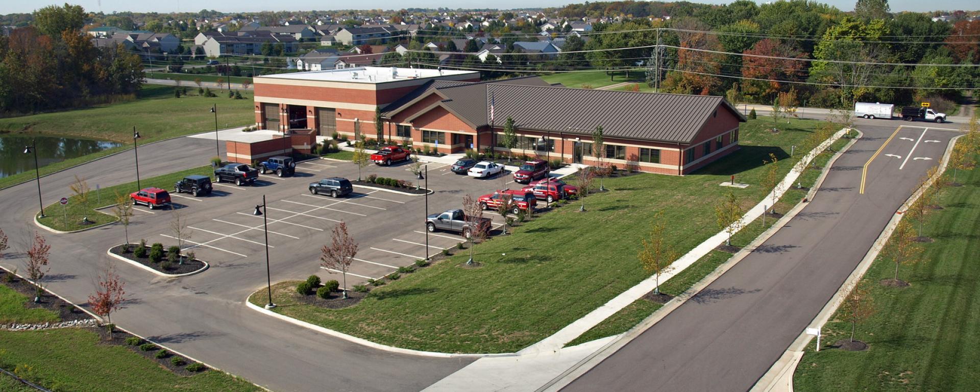aerial of parking lot and firehouse