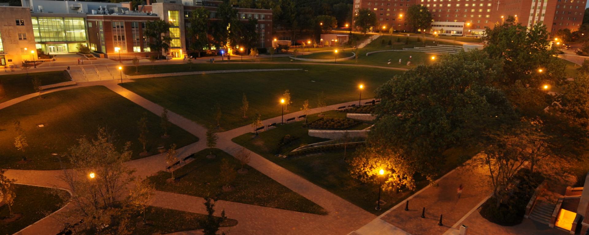 open lawn and walkways at night