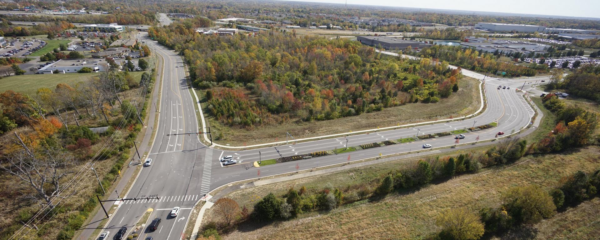 aerial photo of empty interstate ramp turn lanes
