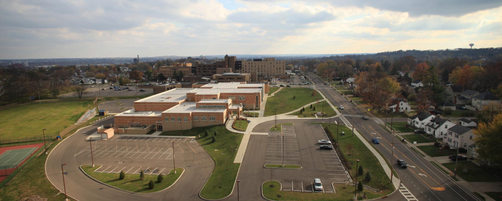 aerial of school building and parking lot