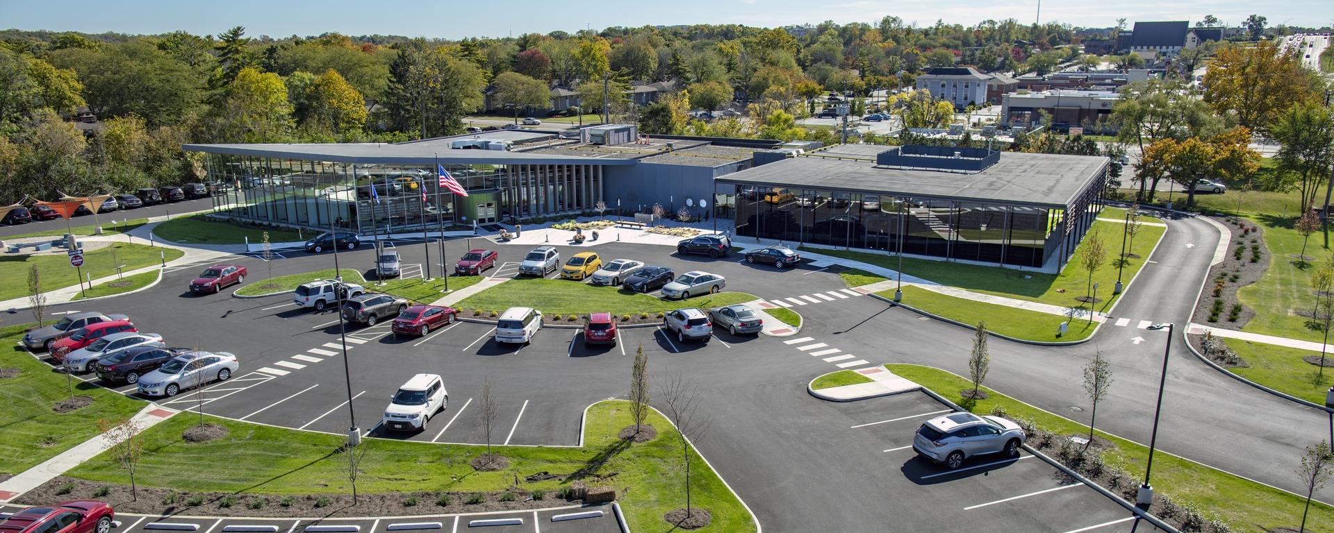 aerial of front entrance of library and parking lot