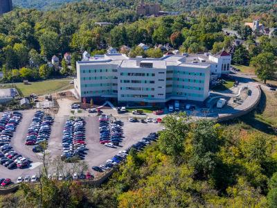 aerial photo of hospital building and parking lot