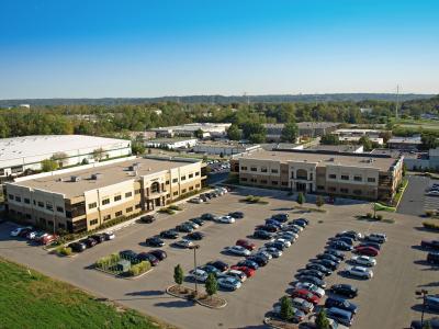 front profiles of buildings and parking lot