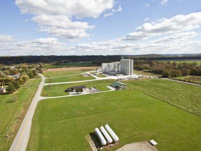 aerial of building and silos